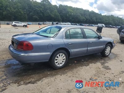 Trzecie zdjęcie samochodu z tyłu: 1999 LINCOLN CONTINENTAL VIN:1LNHM97V4XY610195 - miniatura