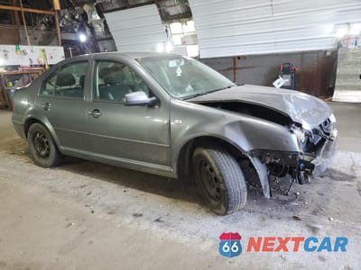 Czwarte zdjęcie samochodu z boku: 2003 VOLKSWAGEN JETTA GL VIN:3VWRK69M73M018004 - miniatura