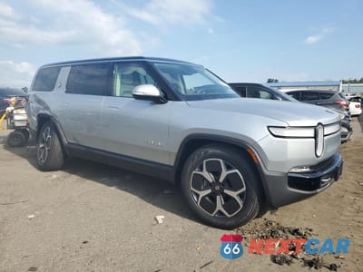 Czwarte zdjęcie samochodu z boku: 2024 RIVIAN R1S ADVENTURE VIN:7PDSGBBA6RN045071 - miniatura