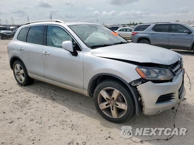 Czwarte zdjęcie samochodu z boku: 2013 VOLKSWAGEN TOUAREG V6 TDI VIN:WVGEP9BP1DD008022 - miniatura