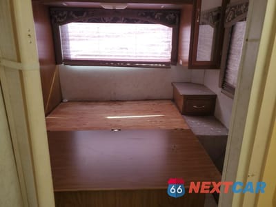 Zdjęcie 9 z 10 samochodu: 2002 FORD ECONOLINE E450 SUPER DUTY CUTAWAY VAN VIN:1FDXE45S22HB06225 - miniatura