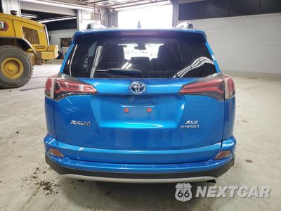 Zdjęcie 6 z 14 samochodu: 2018 TOYOTA RAV4 HV LE VIN:JTMRJREV0JD177316 - miniatura