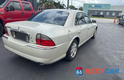 Czwarte zdjęcie samochodu z boku: 2004 LINCOLN LS VIN:1LNHM86S74Y600273 - miniatura