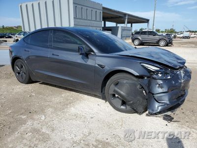 Czwarte zdjęcie samochodu z boku: 2023 TESLA MODEL 3 VIN:5YJ3E1EA6PF553284 - miniatura