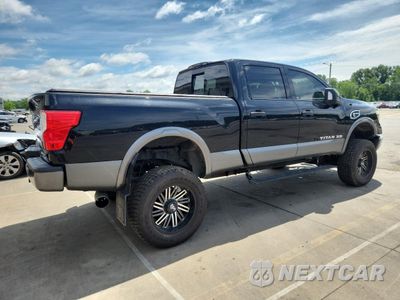 Trzecie zdjęcie samochodu z tyłu: 2017 NISSAN TITAN XD SL VIN:1N6BA1F44HN511180 - miniatura