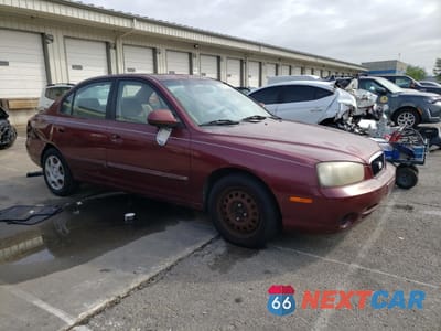 Czwarte zdjęcie samochodu z boku: 2002 HYUNDAI ELANTRA GLS VIN:KMHDN45D42U260866 - miniatura