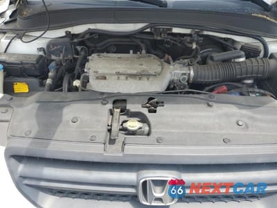Zdjęcie 11 z 12 samochodu: 2005 HONDA PILOT EXL VIN:5FNYF18525B048597 - miniatura