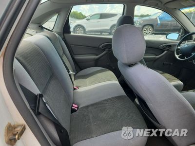 Zdjęcie 10 z 14 samochodu: 2004 FORD FOCUS LX VIN:1FAFP33P84W191529 - miniatura