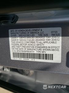 Zdjęcie 12 z 15 samochodu: 2023 HONDA PASSPORT EXL VIN:5FNYF8H56PB030731 - miniatura