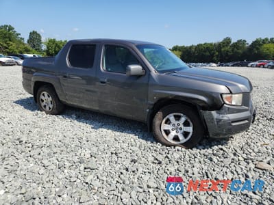 Czwarte zdjęcie samochodu z boku: 2008 HONDA RIDGELINE RTL VIN:2HJYK16548H525720 - miniatura