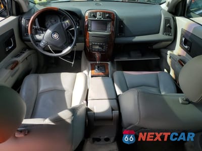 Zdjęcie 8 z 14 samochodu: 2004 CADILLAC SRX VIN:1GYEE637440145738 - miniatura