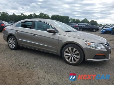 Czwarte zdjęcie samochodu z boku: 2012 VOLKSWAGEN CC SPORT VIN:WVWMP7AN2CE503052 - miniatura
