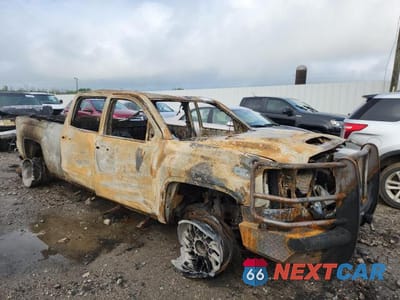 Czwarte zdjęcie samochodu z boku: 2018 GMC SIERRA K2500 DENALI VIN:1GT12UEY0JF268159 - miniatura