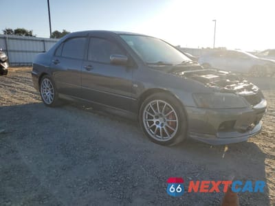 Czwarte zdjęcie samochodu z boku: 2006 MITSUBISHI LANCER EVOLUTION VIN:JA3AH86CX6U061207 - miniatura