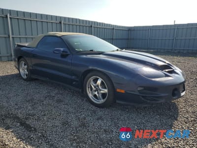 Czwarte zdjęcie samochodu z boku: 2002 PONTIAC FIREBIRD TRANS AM VIN:2G2FV32G022155998 - miniatura