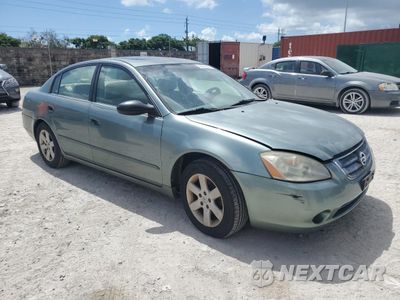 Czwarte zdjęcie samochodu z boku: 2003 NISSAN ALTIMA BASE VIN:1N4AL11D83C186012 - miniatura