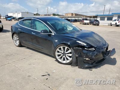 Czwarte zdjęcie samochodu z boku: 2018 TESLA MODEL 3 VIN:5YJ3E1EA1JF053377 - miniatura