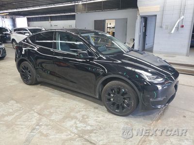 Czwarte zdjęcie samochodu z boku: 2023 TESLA MODEL Y VIN:7SAYGDEE7PA156042 - miniatura