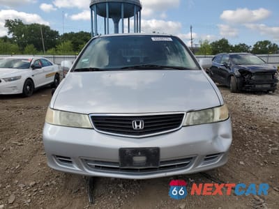 Piąte zdjęcie samochodu w środku: 2001 HONDA ODYSSEY EX VIN:2HKRL18661H601091 - miniatura