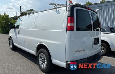Trzecie zdjęcie samochodu z tyłu: 2013 GMC SAVANA G1500 VIN:1GTS8AF44D1154132 - miniatura