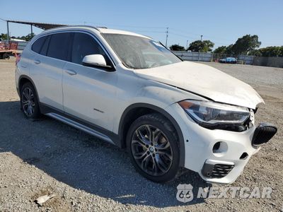 Czwarte zdjęcie samochodu z boku: 2017 BMW X1 SDRIVE28I VIN:WBXHU7C34H5H34974 - miniatura