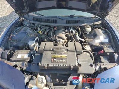 Zdjęcie 11 z 13 samochodu: 2002 PONTIAC FIREBIRD TRANS AM VIN:2G2FV32G022155998 - miniatura