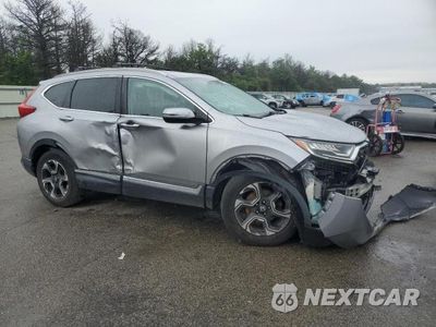 Czwarte zdjęcie samochodu z boku: 2019 HONDA CR-V TOURING VIN:2HKRW2H93KH641699 - miniatura