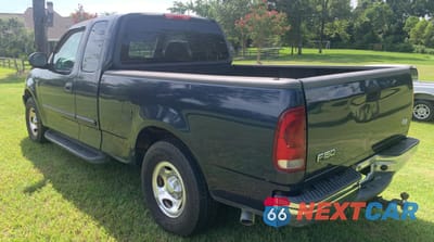 Trzecie zdjęcie samochodu z tyłu: 2002 FORD F150 VIN:1FTRX17W72NB36764 - miniatura