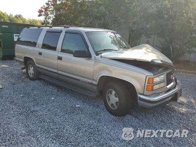 Czwarte zdjęcie samochodu z boku: 1999 GMC SUBURBAN C1500 VIN:3GKEC16R7XG541100 - miniatura
