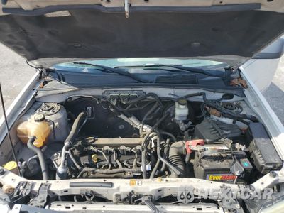 Zdjęcie 12 z 15 samochodu: 2010 MAZDA TRIBUTE I VIN:4F2CY0C74AKM02754 - miniatura