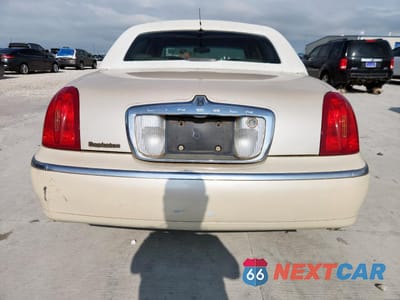 Zdjęcie 6 z 12 samochodu: 1999 LINCOLN TOWN CAR CARTIER VIN:1LNHM83W0XY607285 - miniatura
