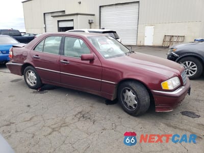 Czwarte zdjęcie samochodu z boku: 1999 MERCEDES-BENZ C 230 VIN:WDBHA24G7XA659733 - miniatura