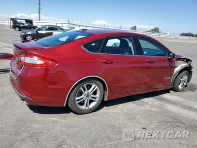 Trzecie zdjęcie samochodu z tyłu: 2016 FORD FUSION SE HYBRID VIN:3FA6P0LU4GR305036 - miniatura