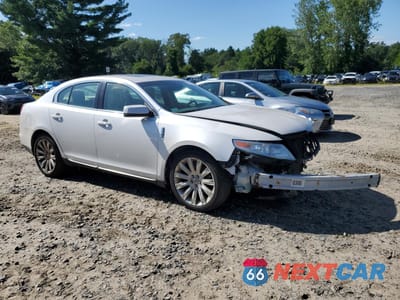 Czwarte zdjęcie samochodu z boku: 2010 LINCOLN MKS VIN:1LNHL9FT7AG613060 - miniatura