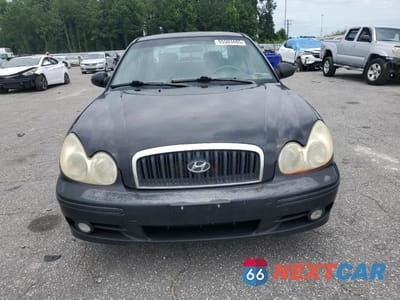 Piąte zdjęcie samochodu w środku: 2003 HYUNDAI SONATA GL VIN:KMHWF25S03A743833 - miniatura