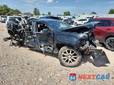 Czwarte zdjęcie samochodu z boku: 2019 GMC CANYON DENALI VIN:1GTP6EE1XK1211649 - miniatura