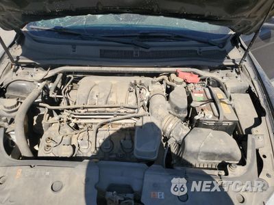 Zdjęcie 11 z 12 samochodu: 2014 FORD TAURUS SEL VIN:1FAHP2E87EG131505 - miniatura