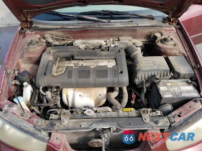 Zdjęcie 11 z 12 samochodu: 2002 HYUNDAI ELANTRA GLS VIN:KMHDN45D42U260866 - miniatura