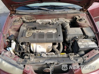 Zdjęcie 11 z 12 samochodu: 2002 HYUNDAI ELANTRA GLS VIN:KMHDN45D42U260866 - miniatura