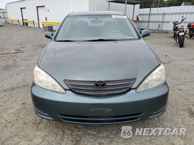 Piąte zdjęcie samochodu w środku: 2002 TOYOTA CAMRY LE VIN:4T1BF30KX2U526217 - miniatura
