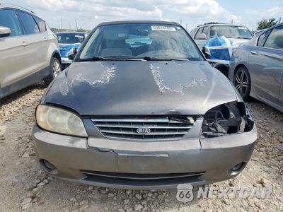 Piąte zdjęcie samochodu w środku: 2003 KIA SPECTRA BASE VIN:KNAFB121835264507 - miniatura