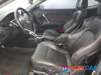 Zdjęcie 7 z 14 samochodu: 2005 HYUNDAI TIBURON GT VIN:KMHHN65F25U164141 - miniatura