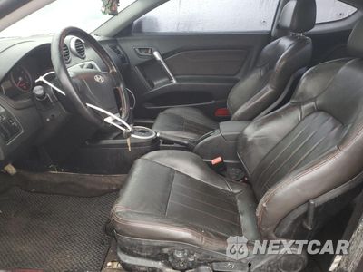Zdjęcie 7 z 14 samochodu: 2005 HYUNDAI TIBURON GT VIN:KMHHN65F25U164141 - miniatura