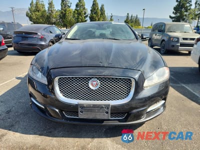 Piąte zdjęcie samochodu w środku: 2013 JAGUAR XJL PORTFOLIO VIN:SAJWA2GB4DLV42802 - miniatura