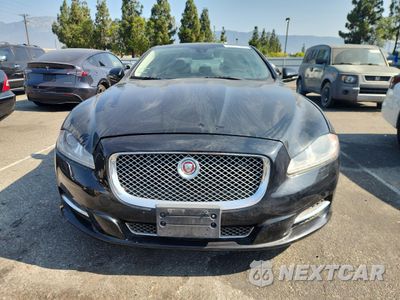 Piąte zdjęcie samochodu w środku: 2013 JAGUAR XJL PORTFOLIO VIN:SAJWA2GB4DLV42802 - miniatura