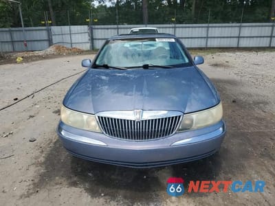 Piąte zdjęcie samochodu w środku: 1999 LINCOLN CONTINENTAL VIN:1LNHM97V4XY610195 - miniatura