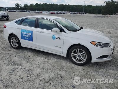 Czwarte zdjęcie samochodu z boku: 2018 FORD FUSION SE HYBRID VIN:3FA6P0LU3JR261599 - miniatura