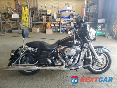 2009 HARLEY-DAVIDSON FLHX 1HD1KB4149Y617525 - główne zdjęcie licytacji z USA - miniatura