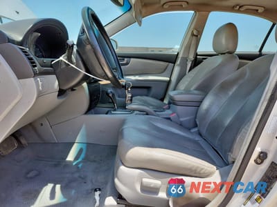 Zdjęcie 7 z 14 samochodu: 2007 KIA OPTIMA LX VIN:KNAGE124375108192 - miniatura