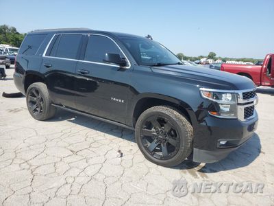 Czwarte zdjęcie samochodu z boku: 2020 CHEVROLET TAHOE C1500 LT VIN:1GNSCBKC0LR101534 - miniatura